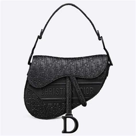 dior embossed saddle bag|Dior saddle bag street style.